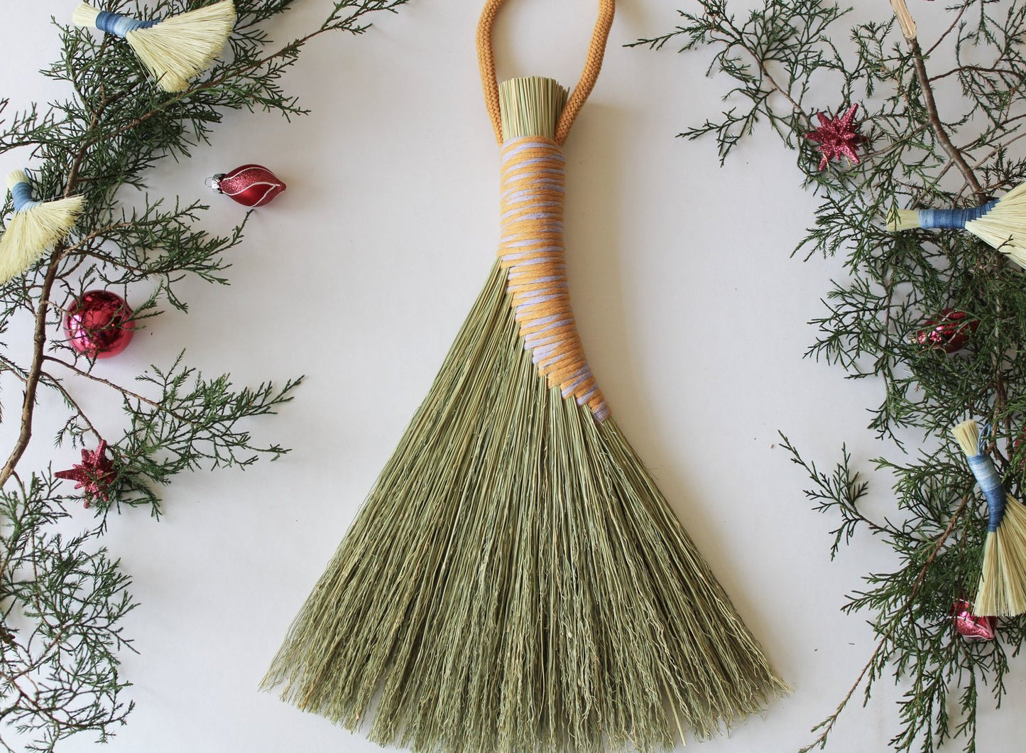 Handbroom-with-two-tone-white-orange-thread-handle