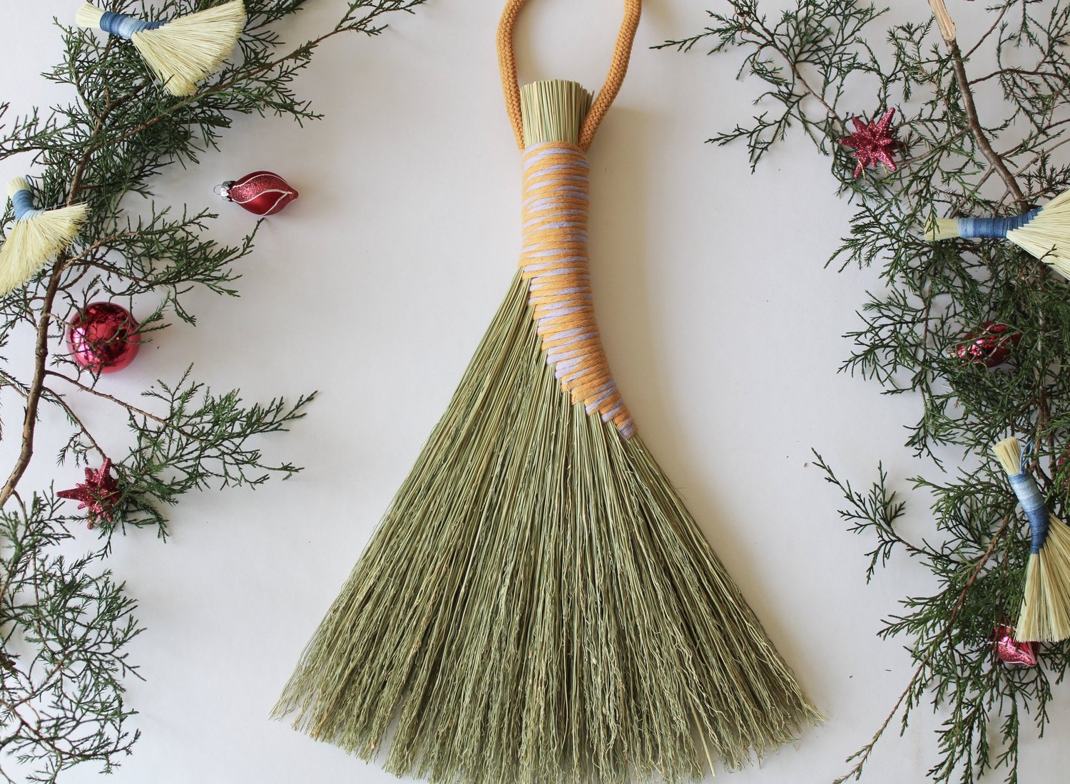 Handbroom-with-two-tone-white-orange-thread-handle