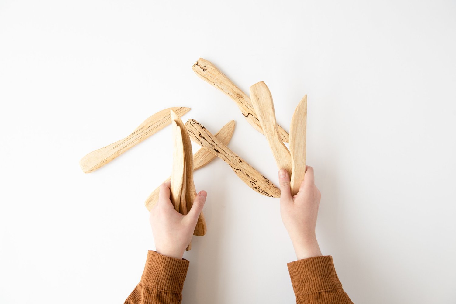 Cynthia-holding-Many-Spreading-knifes