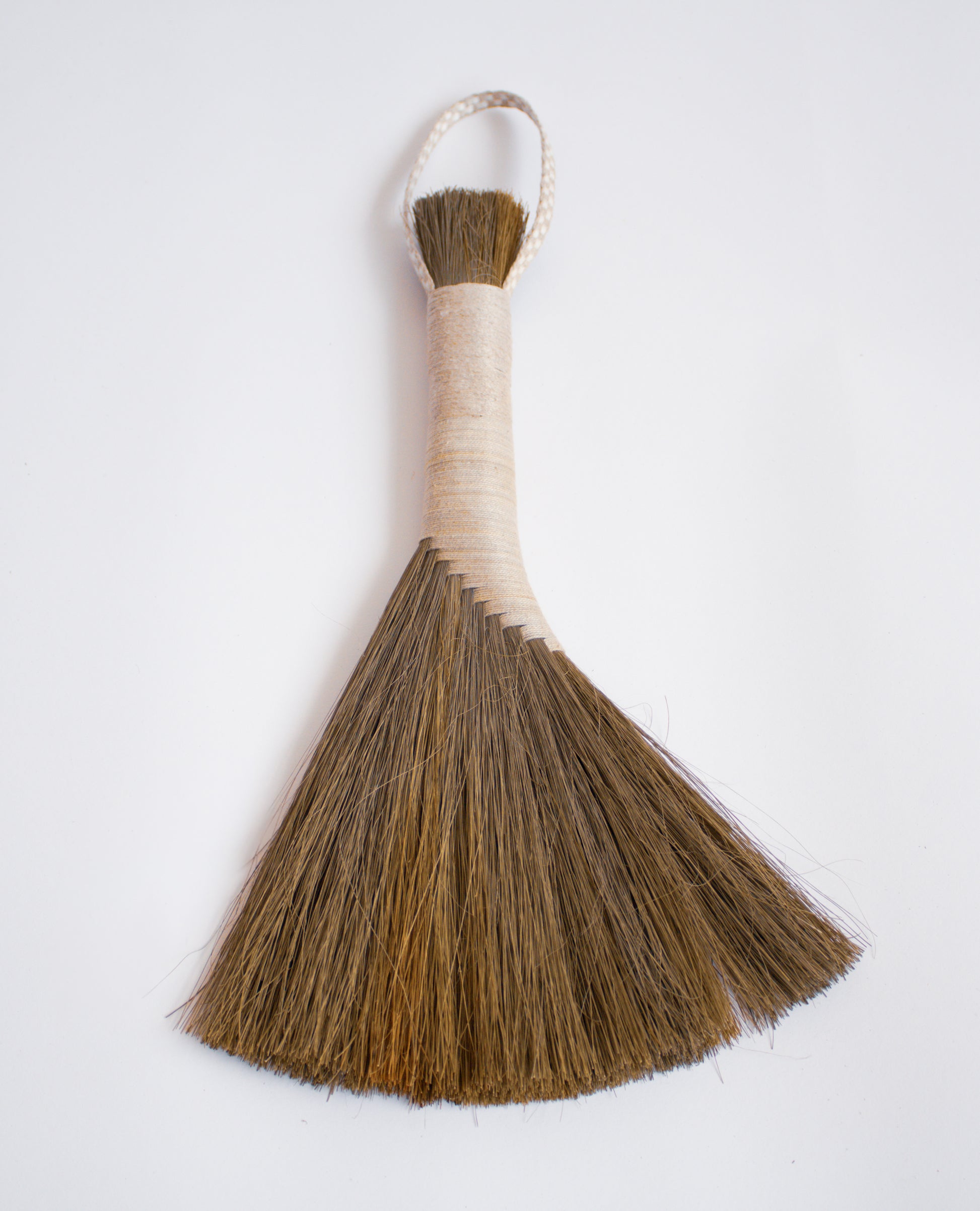 Dark-Tampico-handbroom-with-pink-threaded-handle 