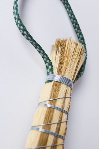 Metal wrapped brushes and brooms