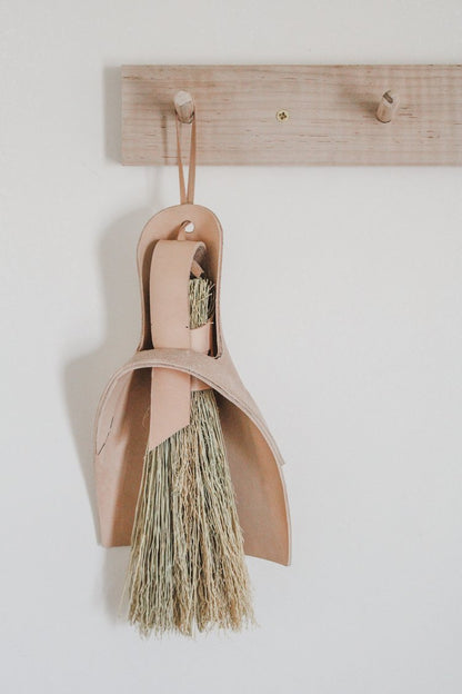 nesting-broom-on-Maple peg rail
