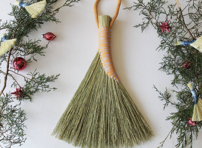 Handbroom-with-two-tone-white-orange-thread-handle 