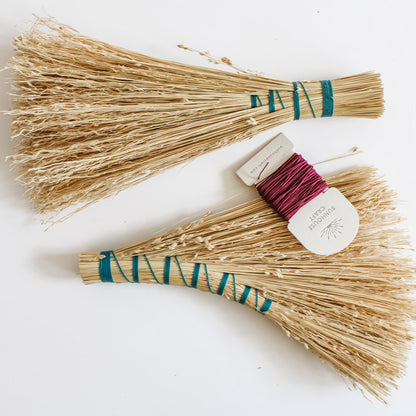 Two-handbrooms-with-green-threaded-handles