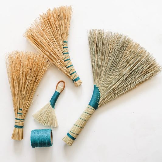 Brushes-with-green-thread