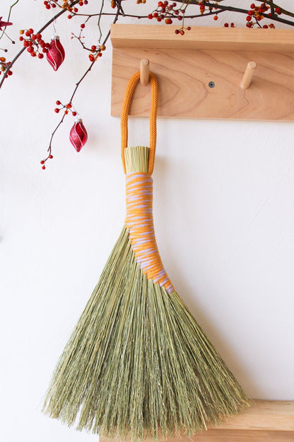 Handbroom-with-two-tone-white-orange-thread-handle 