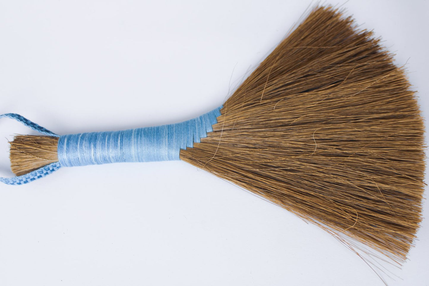 Dark-Tampico-handbroom-with-light-blue-threaded-handle