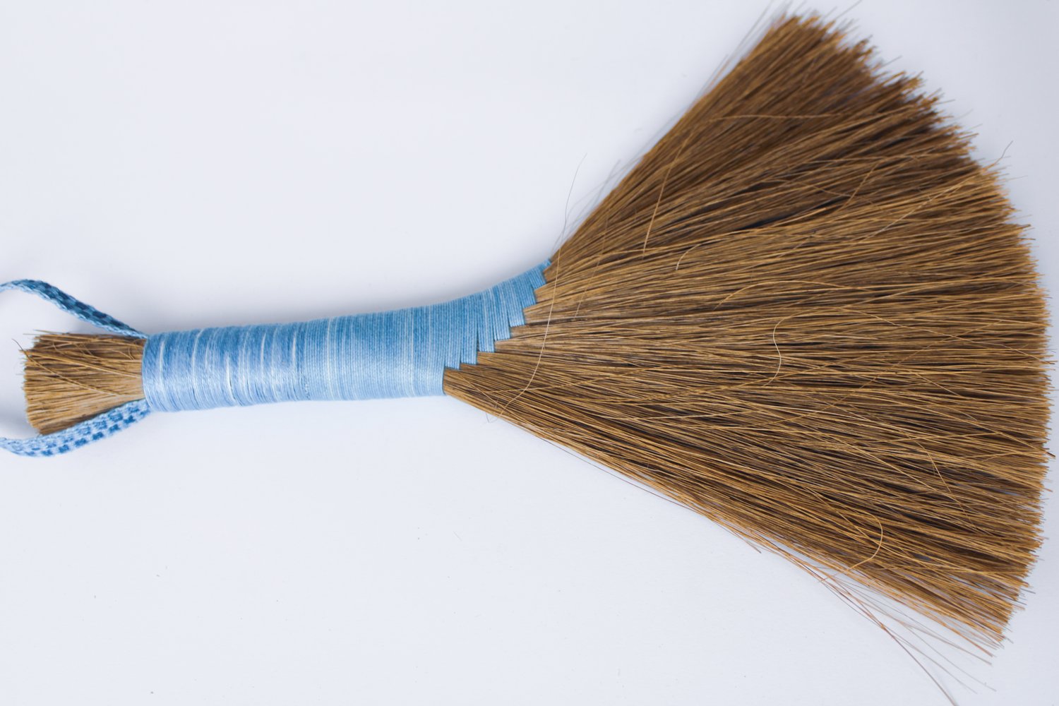 Dark-Tampico-handbroom-with-light-blue-threaded-handle