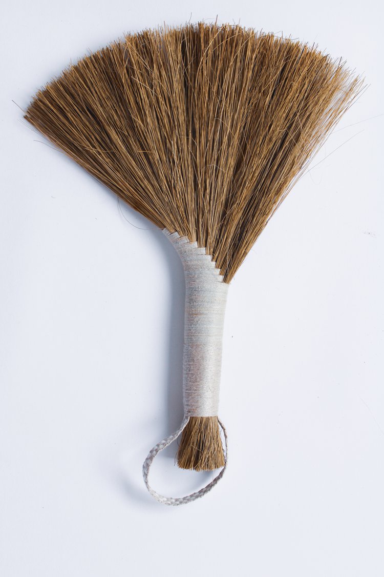 Dark-Tampico-handbroom-with-white-threaded-handle