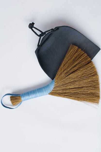 Blue-thread-dark-wing-with-black-leather-dustpan