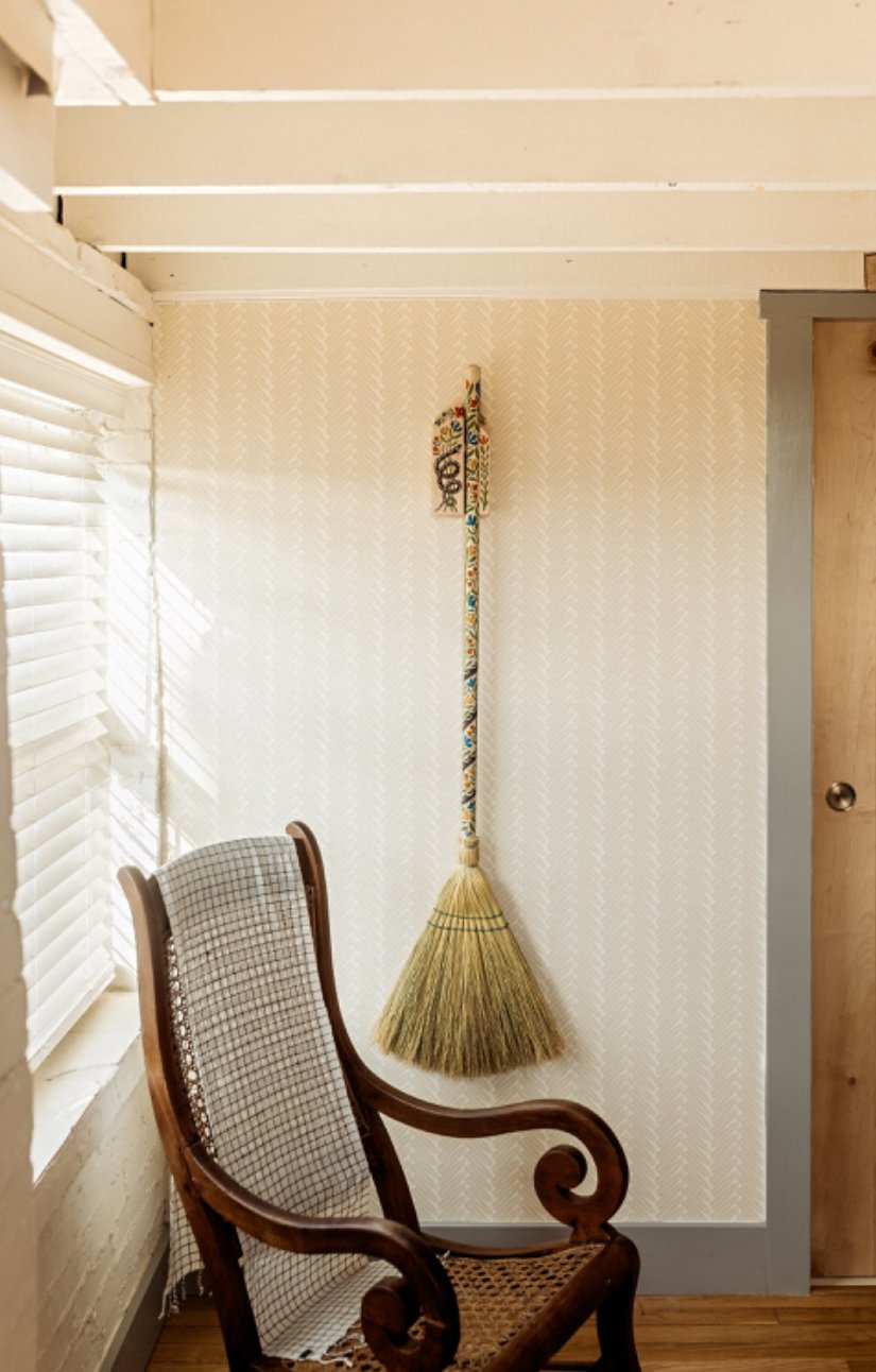 Becca-Jane-Koehler-Dutch-Broom-Hanger-On-Wall-With-Broom-In-Living-Room