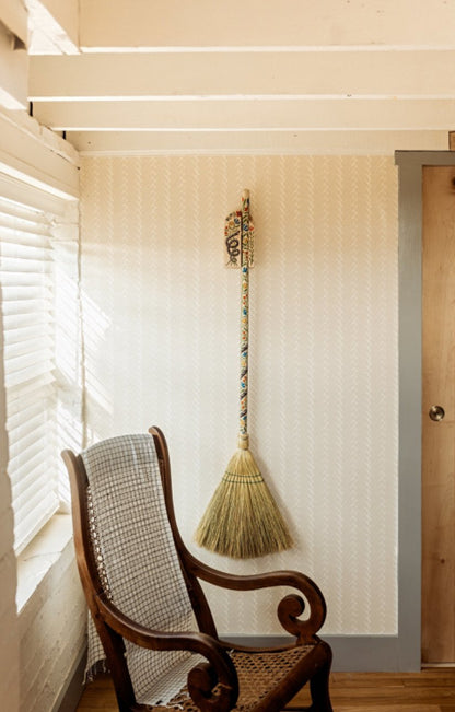 Becca-Jane-Koehler-Dutch-Broom-Hanger-On-Wall-With-Broom-In-Living-Room